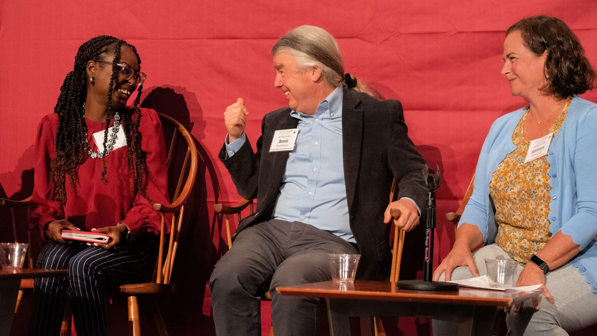 Seated on stage at the Guilford Dialogues are, from left: Roodline Volcy, Dennis Quaintance, and Guenevere Abernathy.