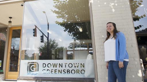 Student Elizabeth Marshall '18 poses for a portrait outside the Downtown Greensboro offices.