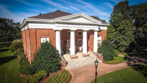 Photo of the front of Guilford College's New Garden Hall and Office of Admission