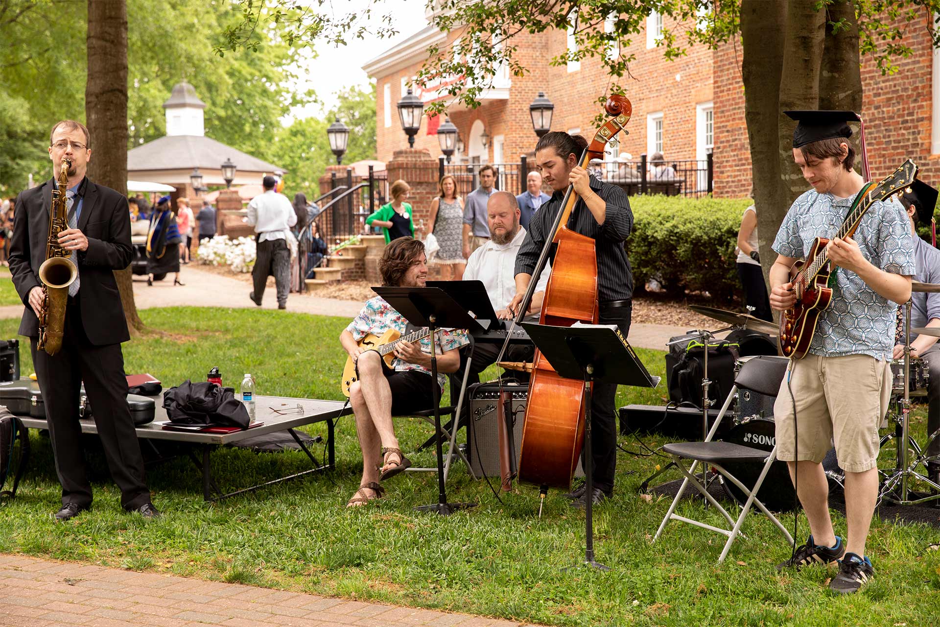 Musicians perform for visitors after Commencement.
