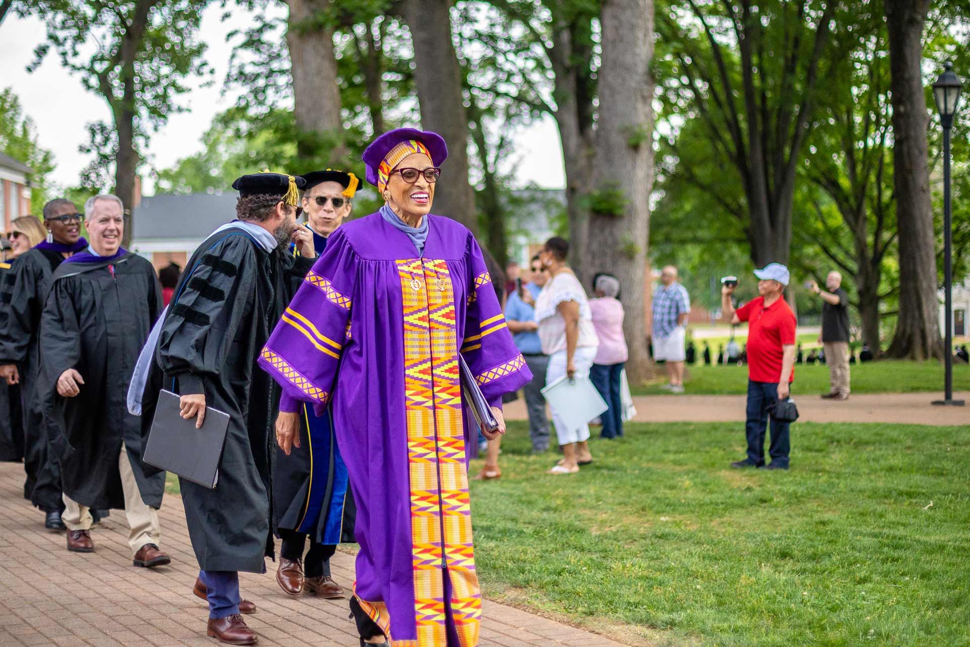 Dr. Johnnetta Betsch Cole, the featured speaker, walks to Commencement.