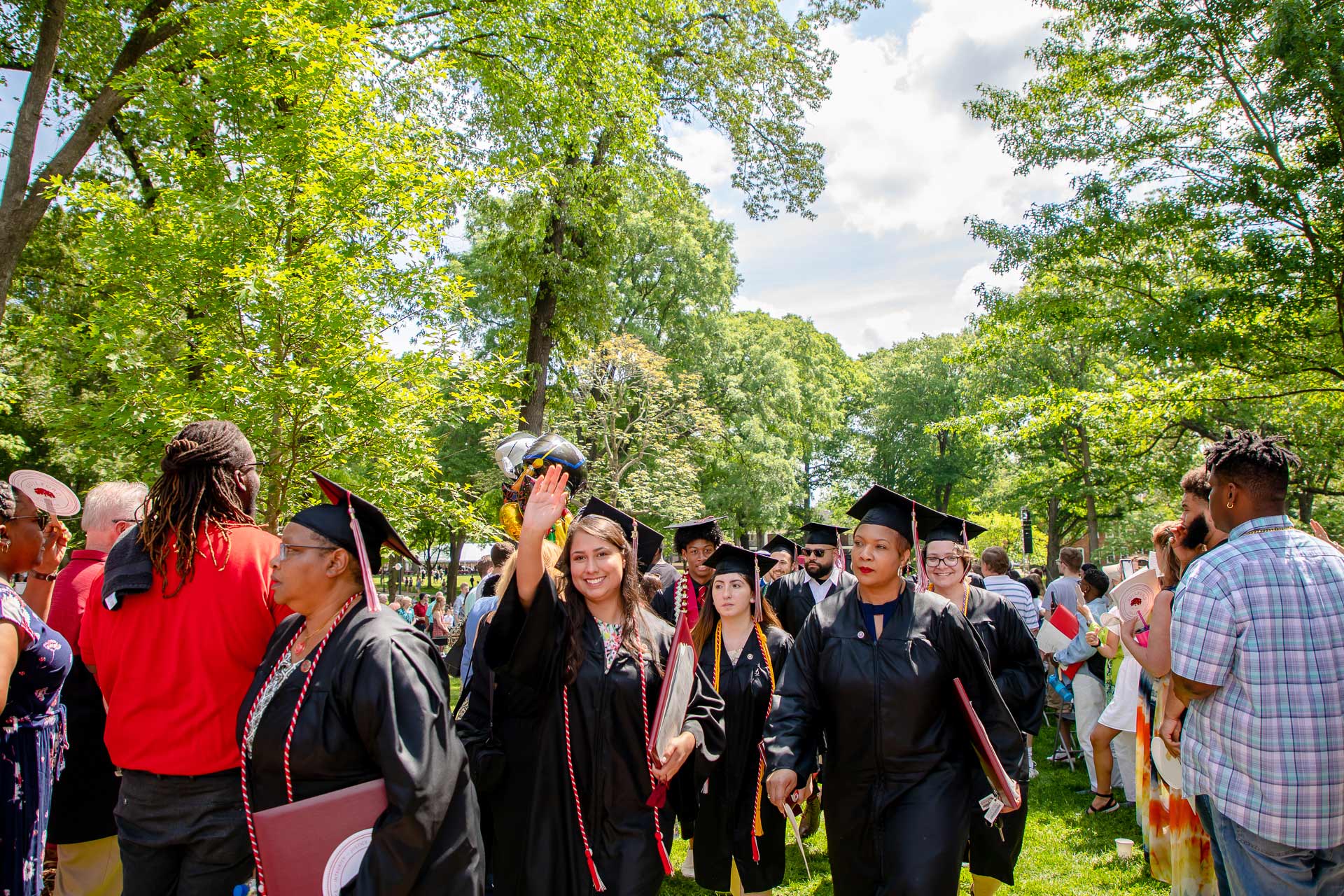 Students graduate after receiving their diplomas.