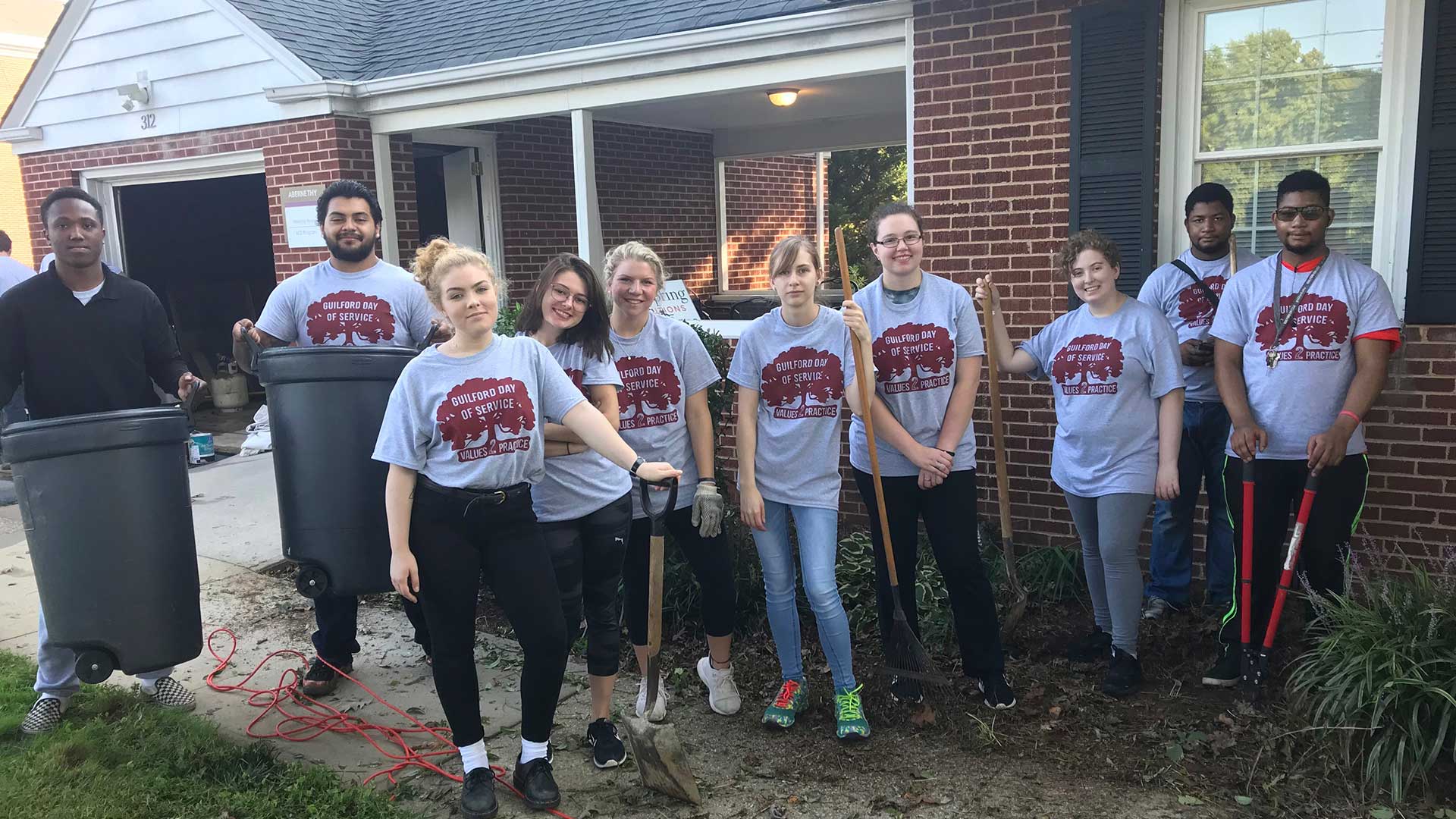 Students clean and paint a local church on Day of Service.