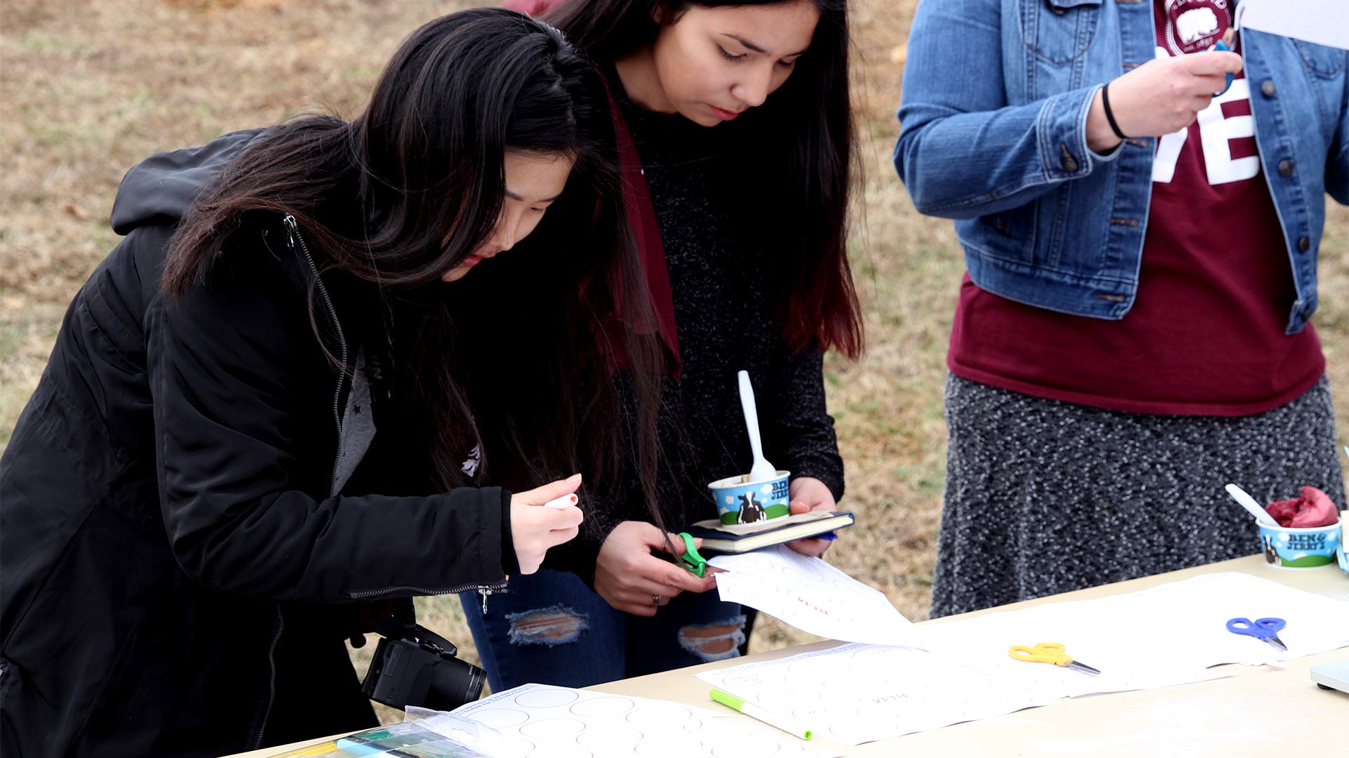 Students enjoy the activities by the Campus Lake.