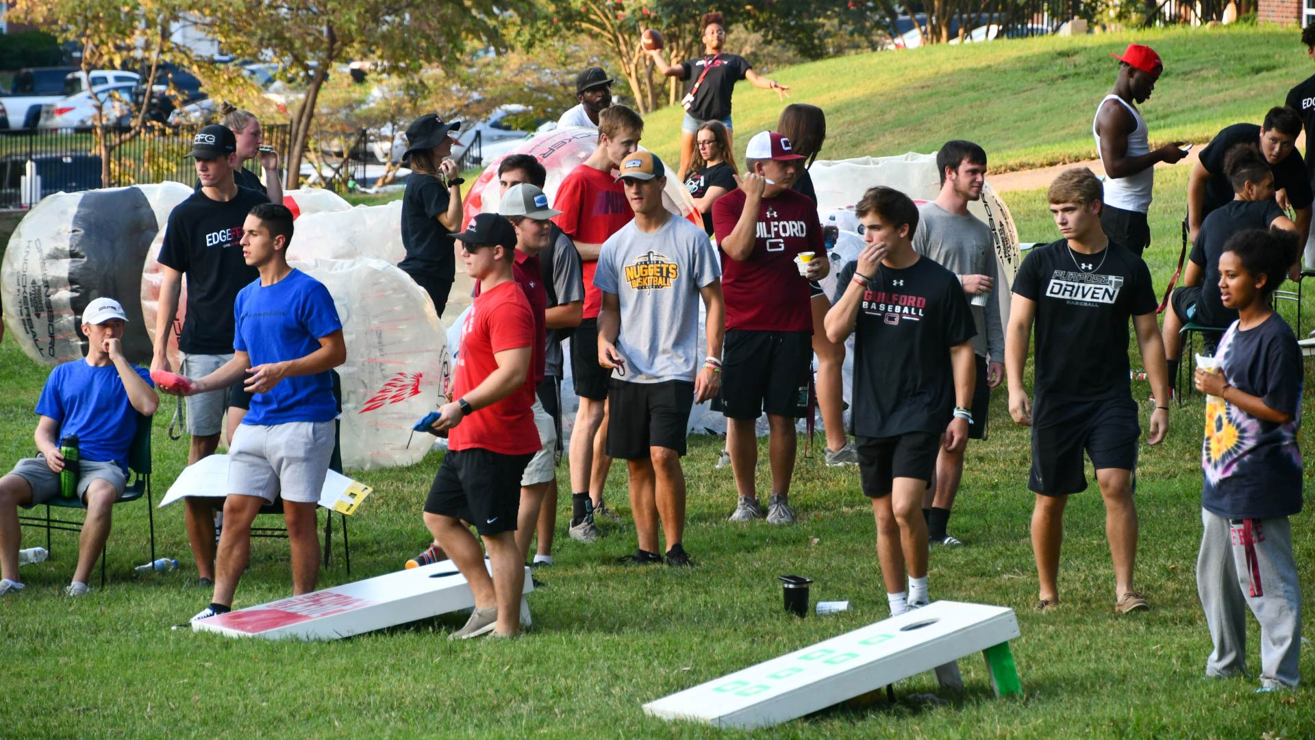 Students play corn hole at EdgeFest.