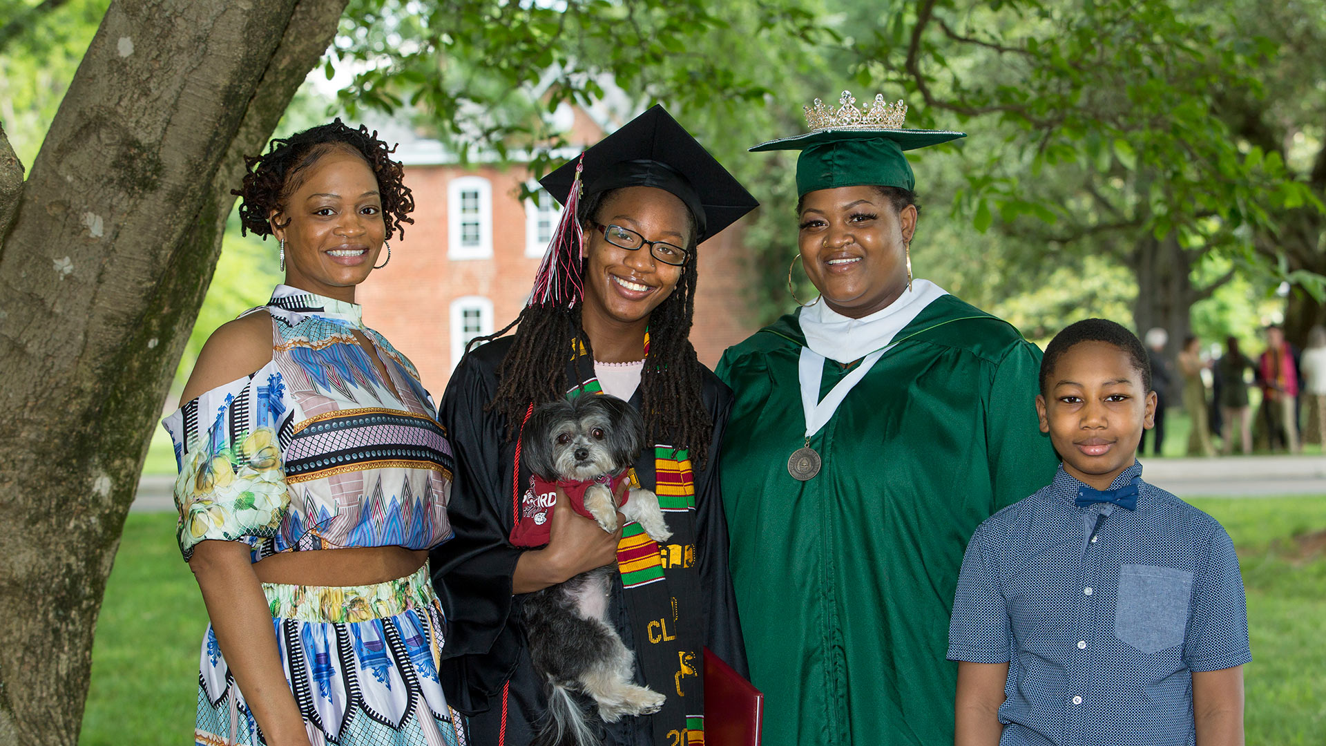 A member of the Class of 2021 takes a photo with friends.