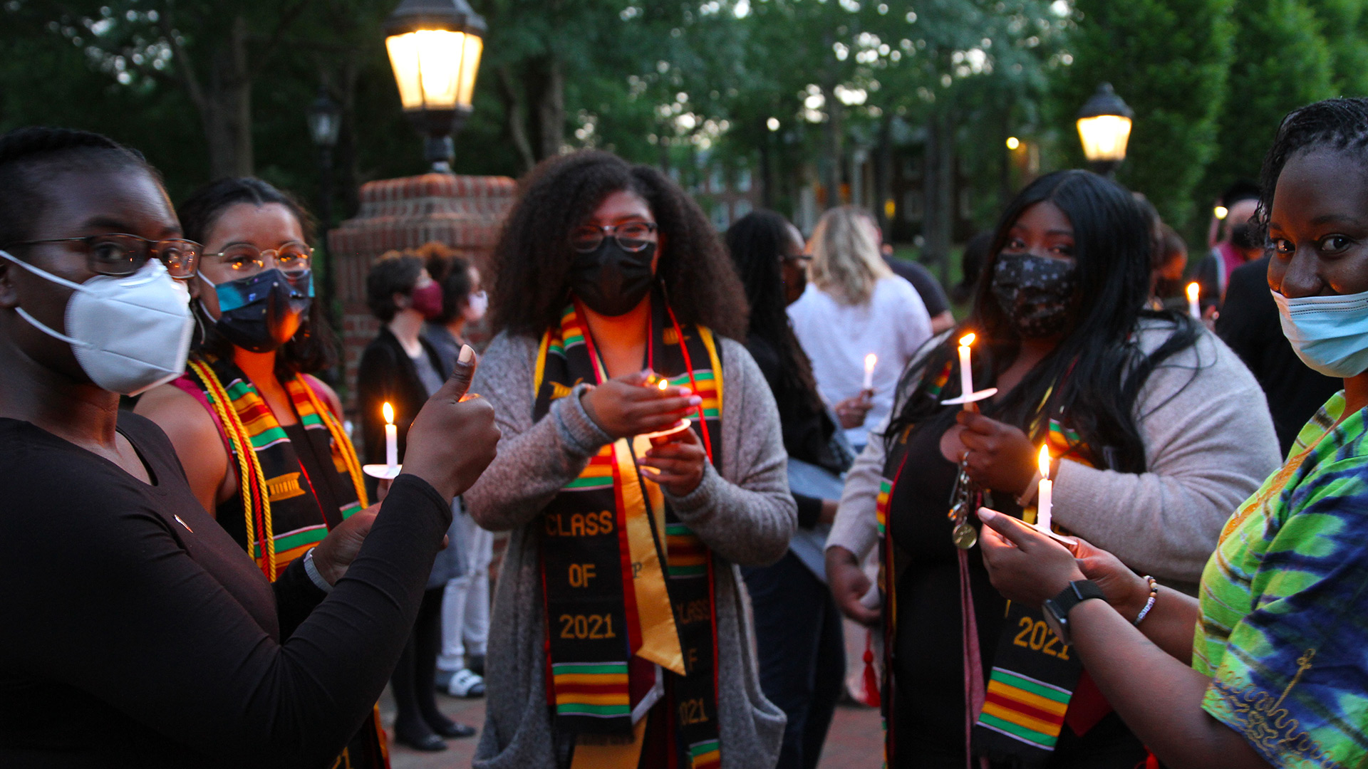 Friends from the classes of 2020 and 2021 Toast to the Light.