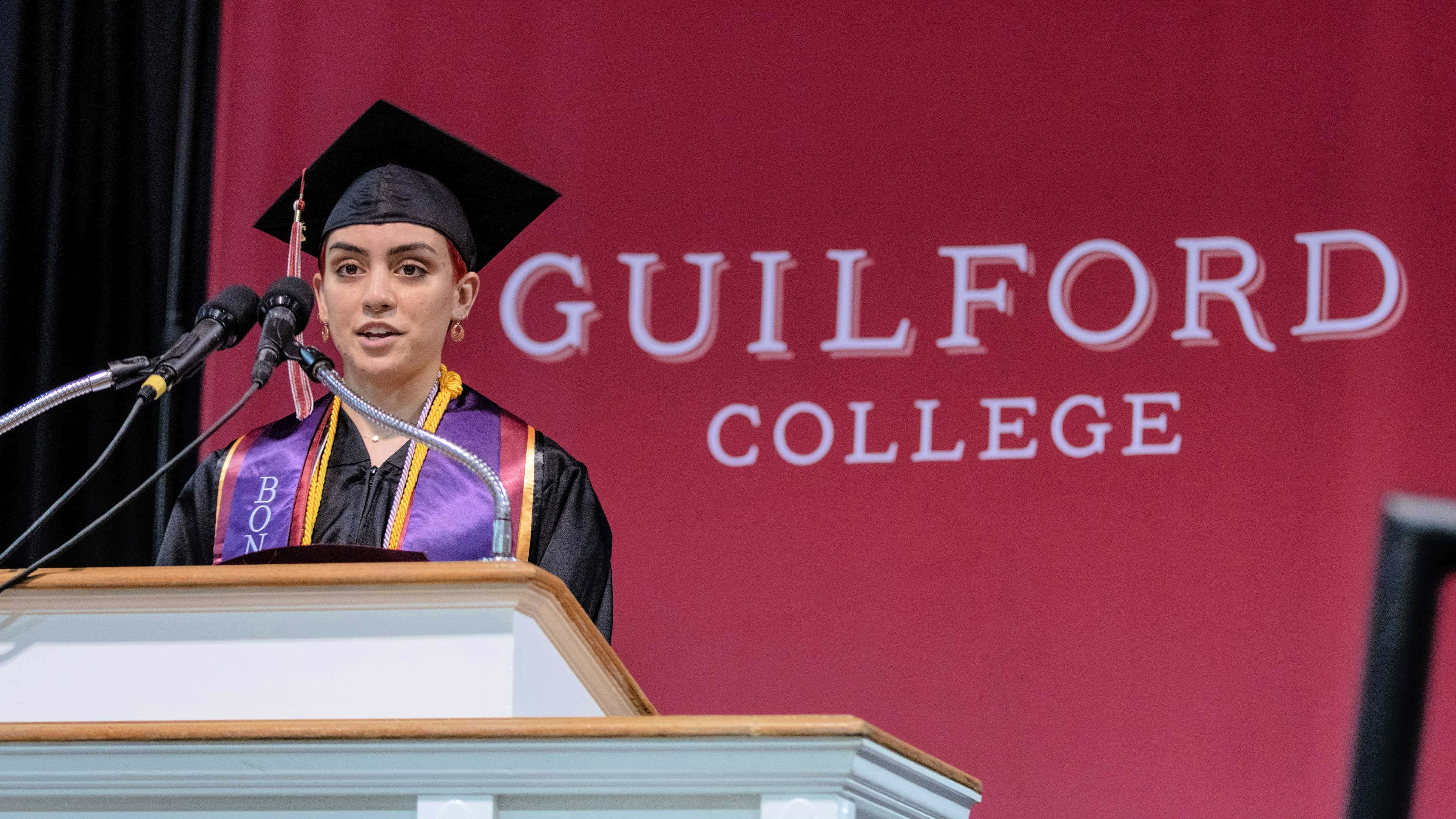 Student Speaker Ananya Bernardo '22 speaks from the podium at Commencement.