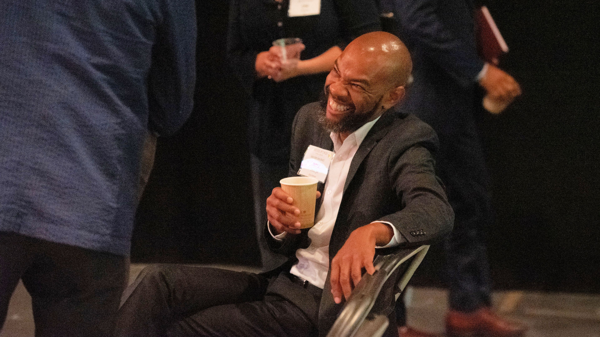 Antioch, Calif., Mayor Lamar Thorpe smiles as he chats at the Guilford Dialogues.