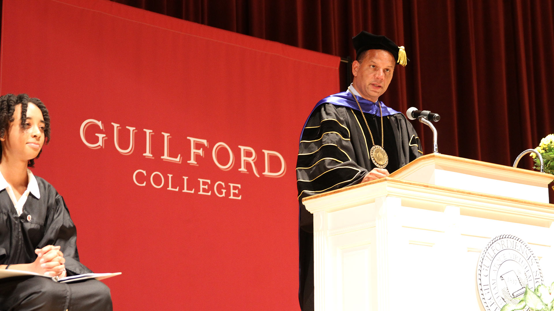 President Kyle Farmbry speaks onstage at Convocation 2022.