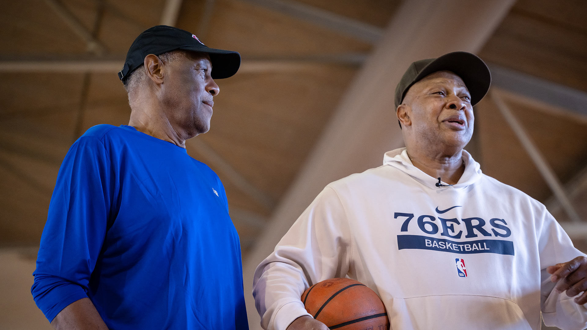 M.L. Carr ‘73 and World B. Free ‘76 prior to the anniversary celebration.