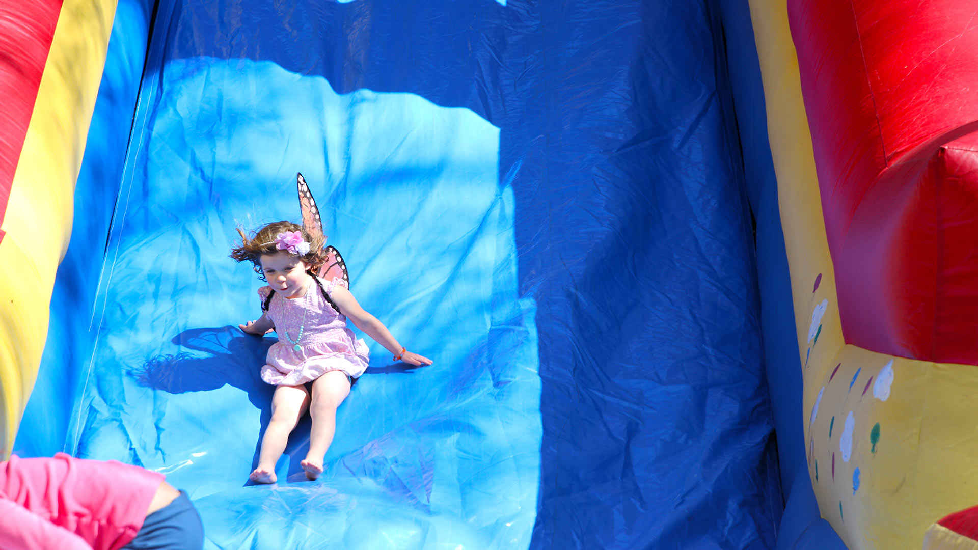 The Community Celebration included inflatables for younger family members.