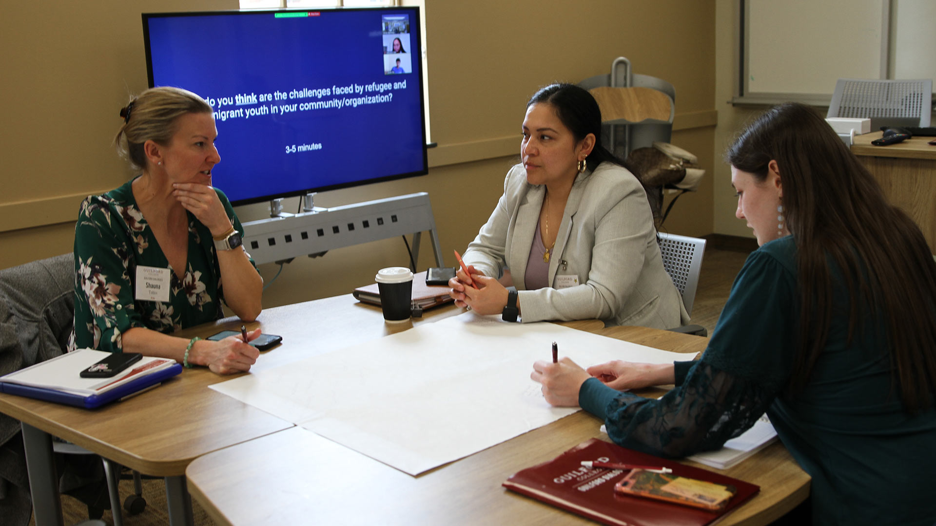 A workshop session Friday afternoon discussing refugee education opportunities and challenges.