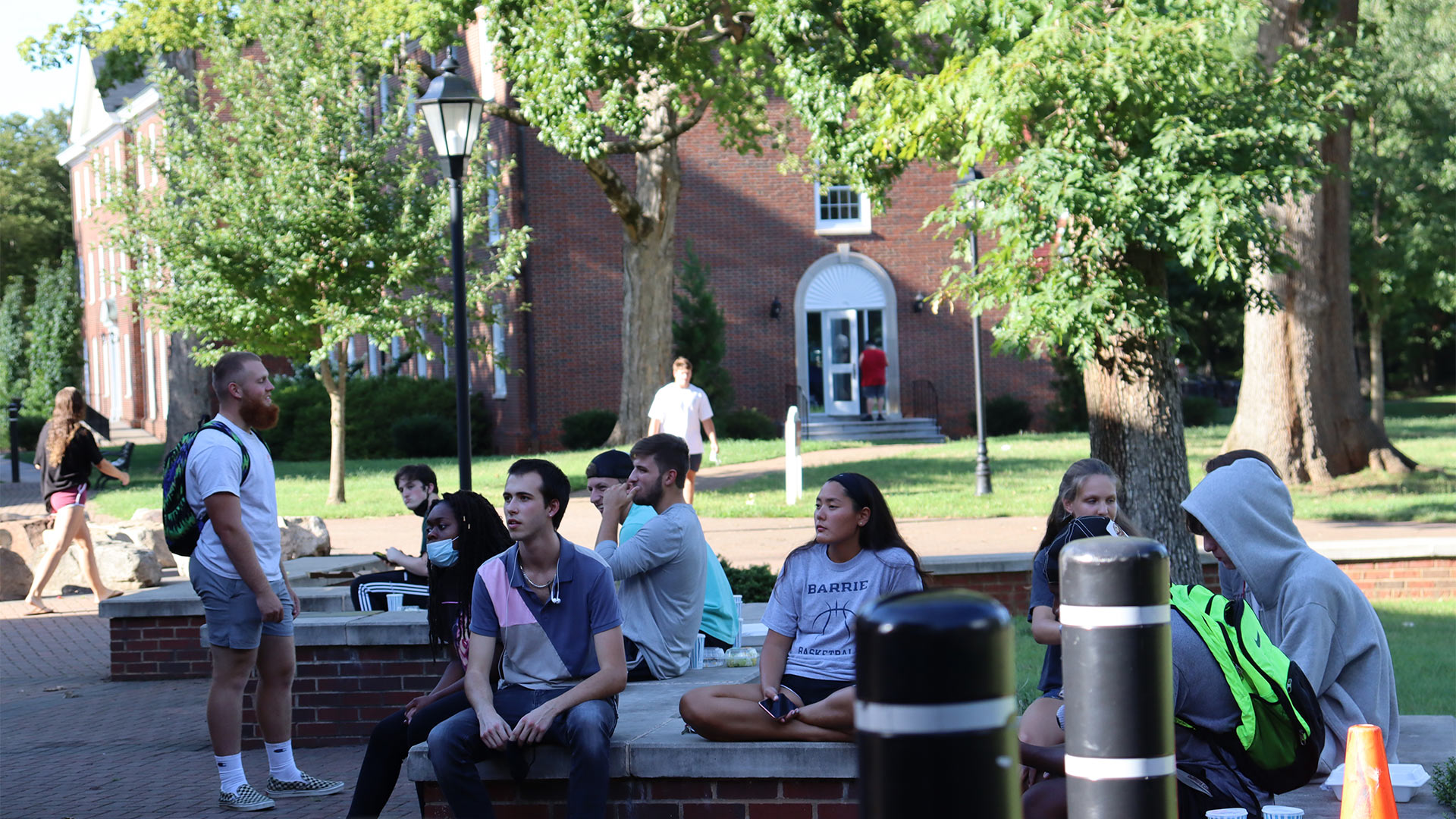 Students sit together to enjoy the jazz performance.