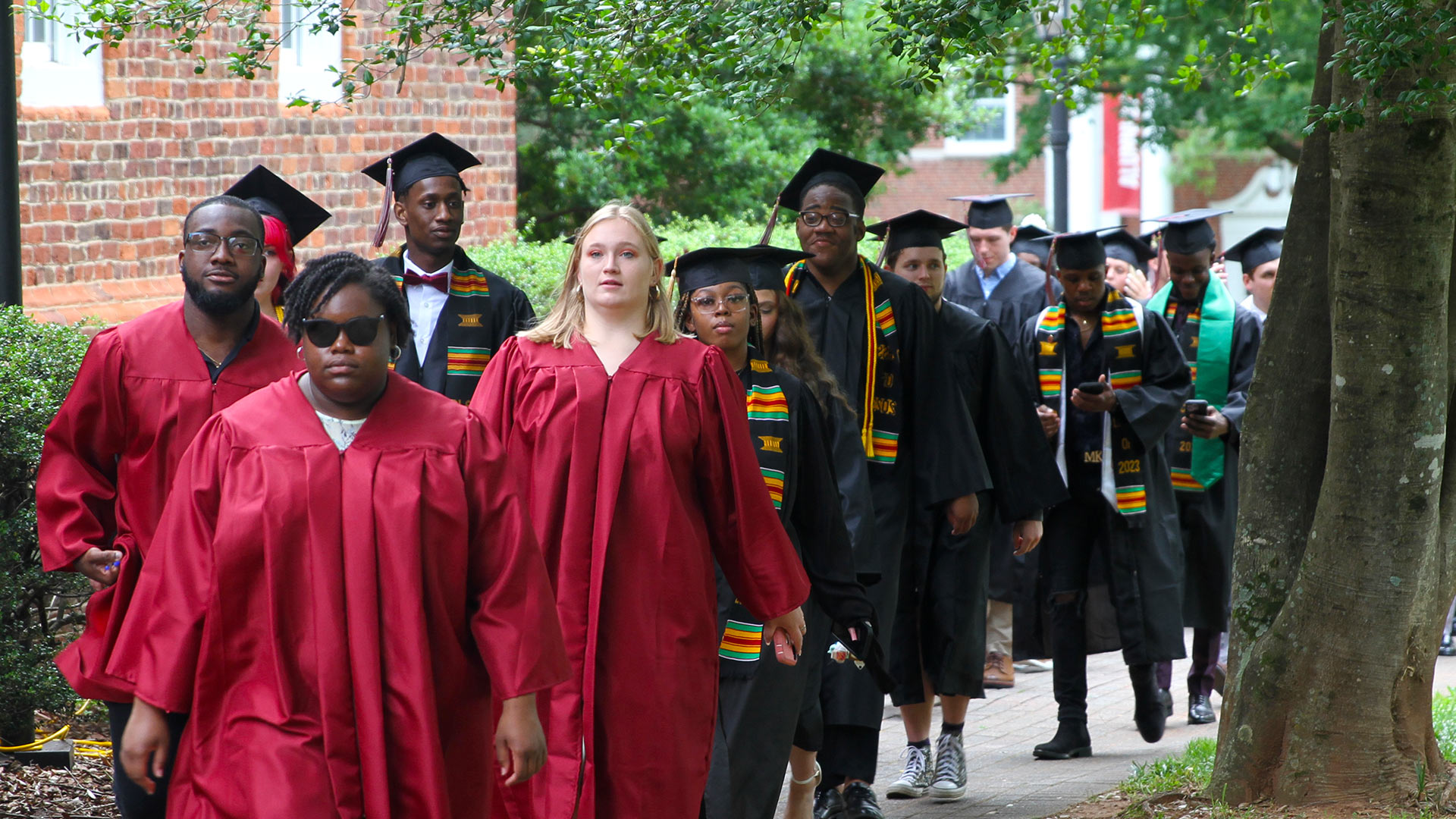 Student Marshals lead the procession