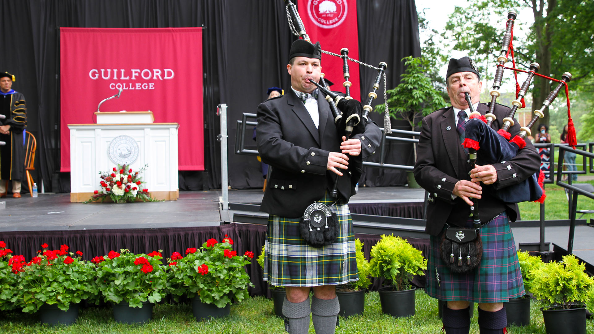 Bagpipers play in the graduates