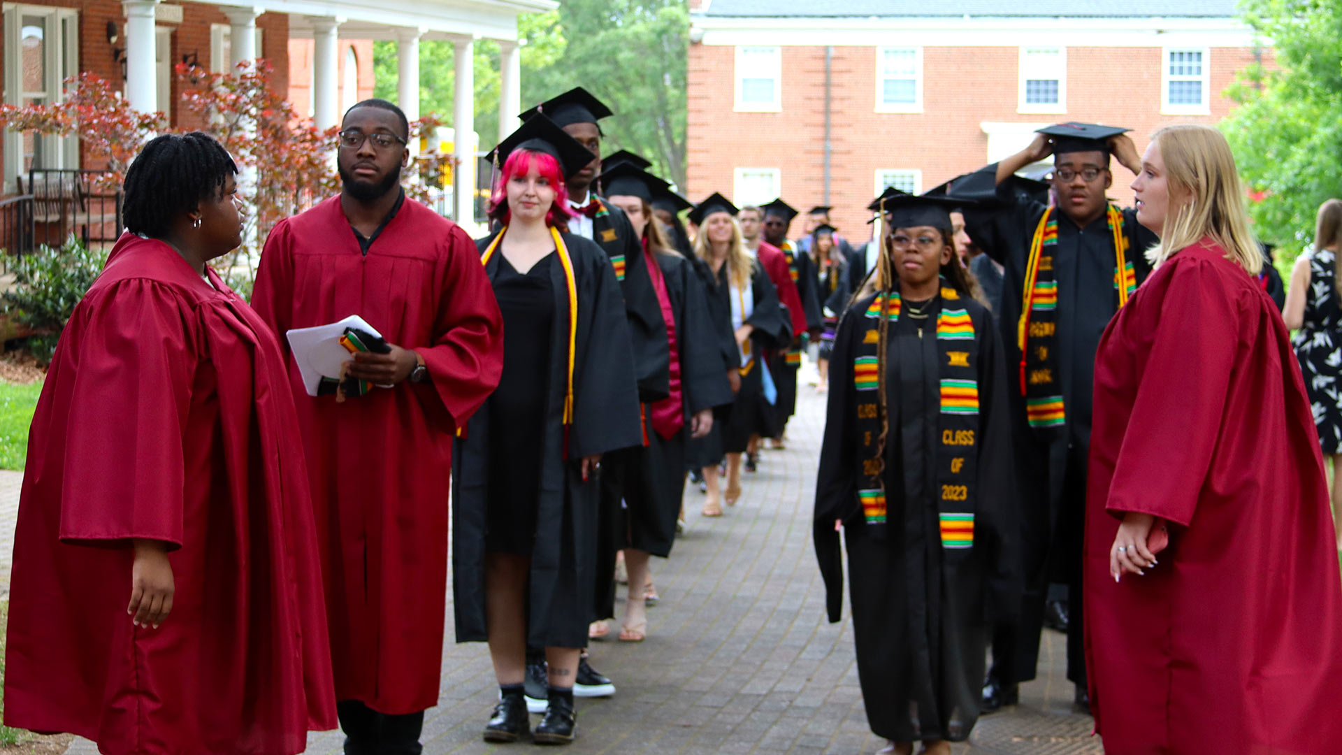 Graduates await faculty in the procession