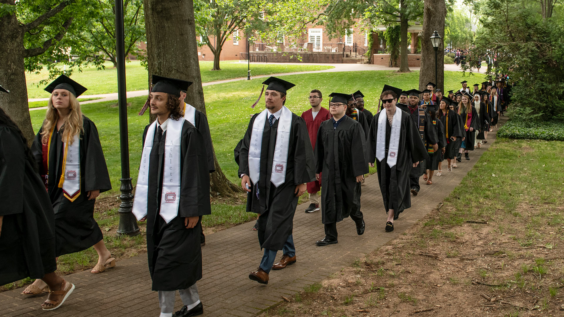 Graduates approaching the waiting crowd