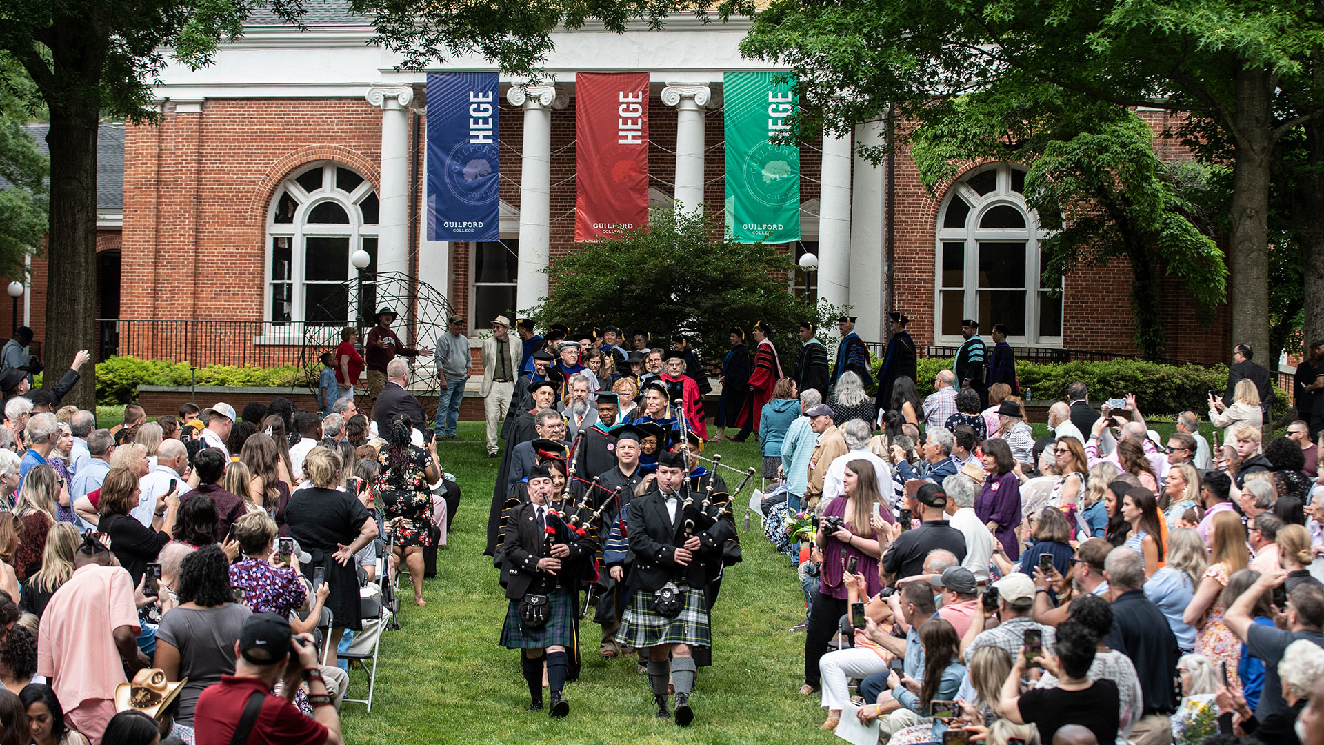 The Commencement procession enters the Quad