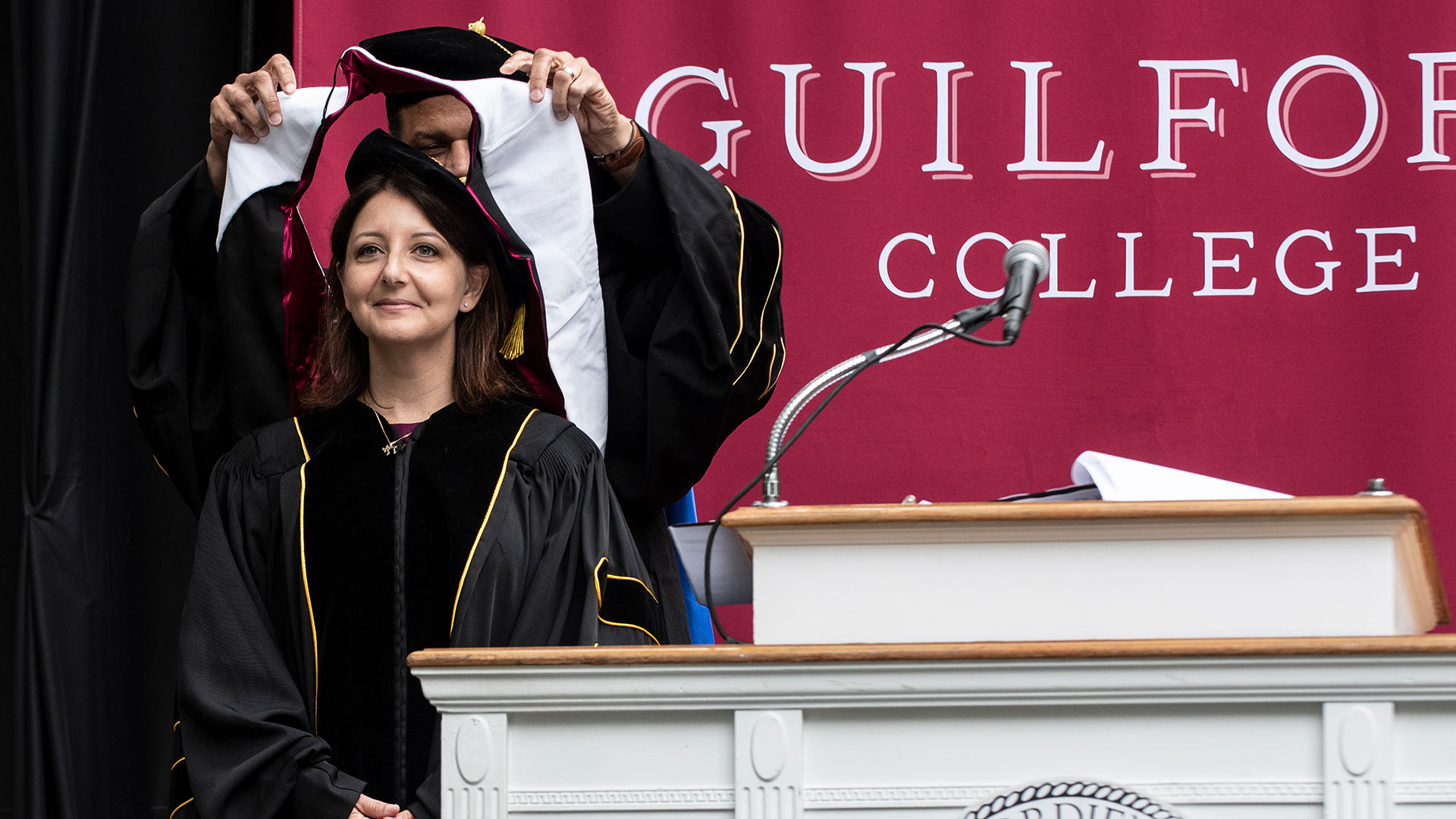 Kyle Farmbry presents an Honorary Degree to Mandy Cohen