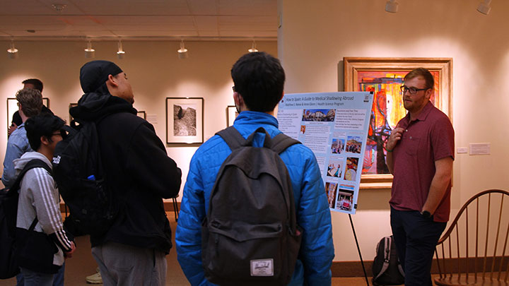 Guilford College students in library