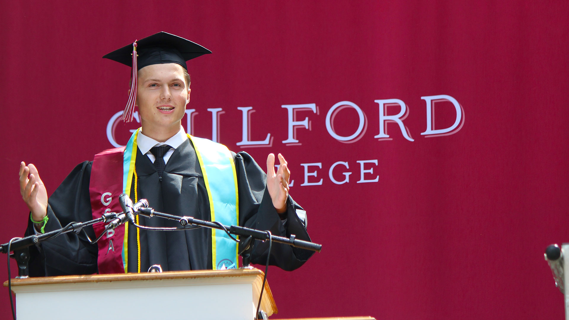 Student Body President Jacob Mitchell '25 greets attendees