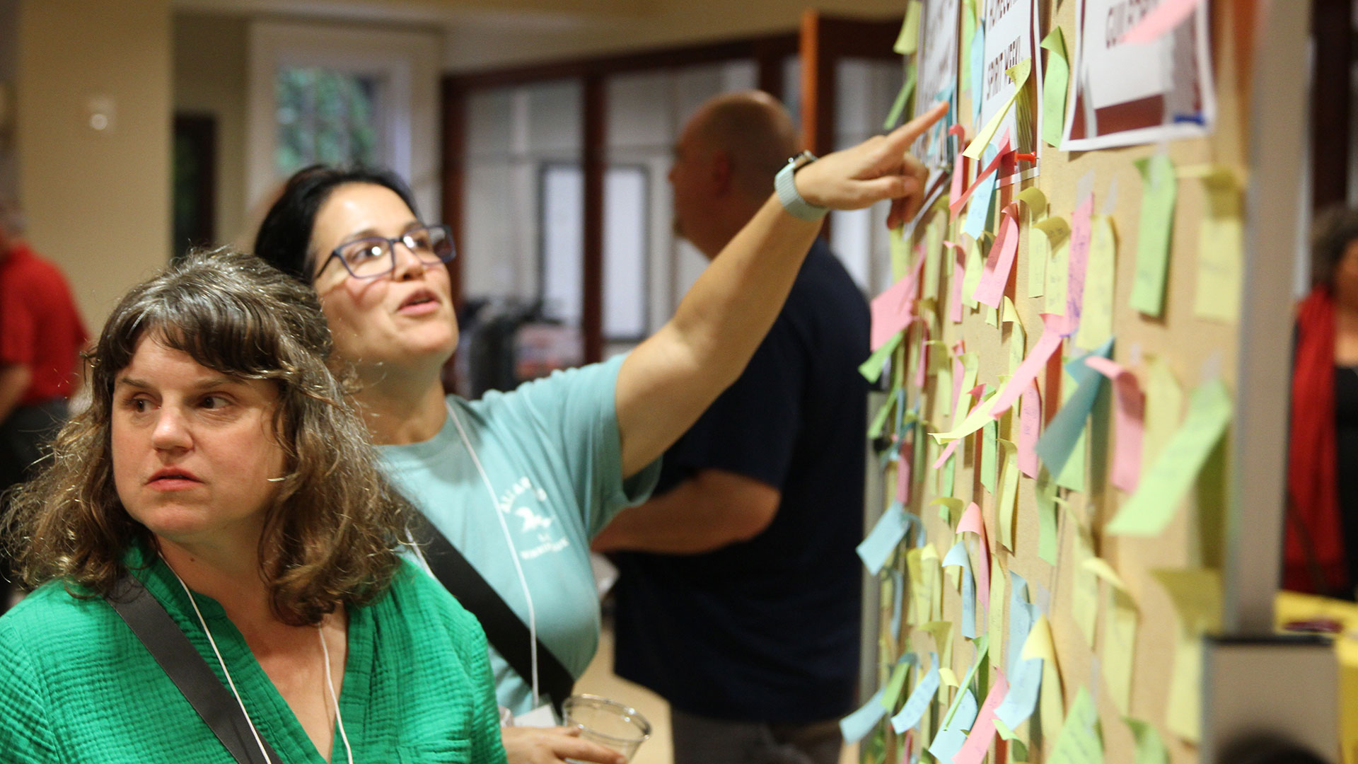Alumni read notes from current students in Founders Hall
