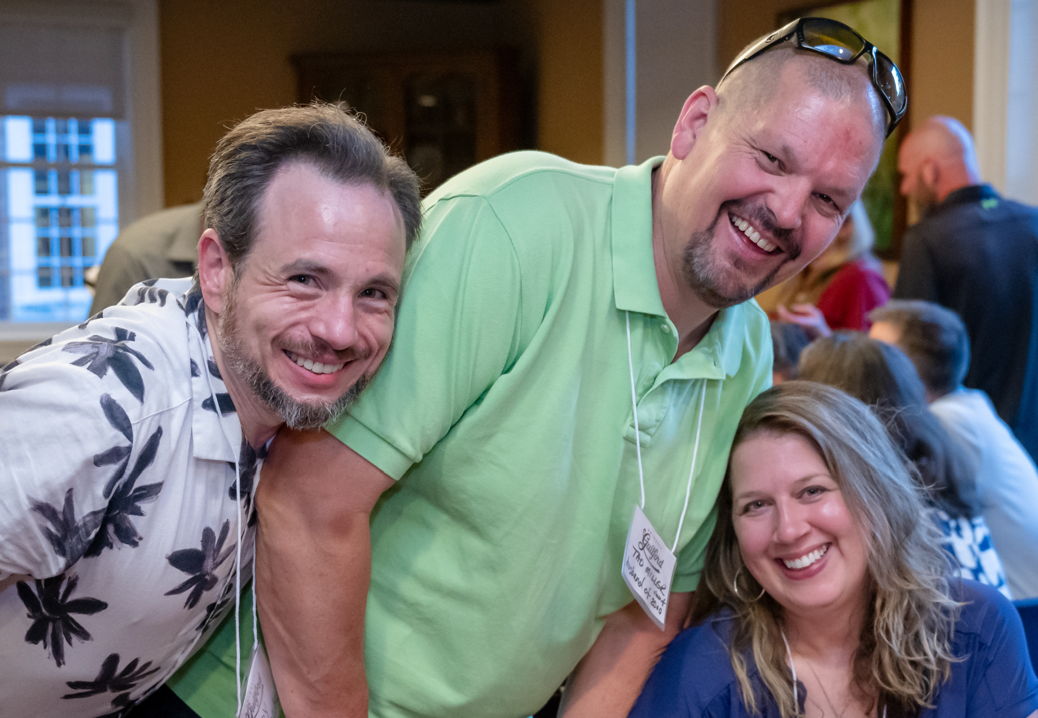 Andy Bostick '00, Tad and Dana Miller '00 enjoy their 25th reunion.