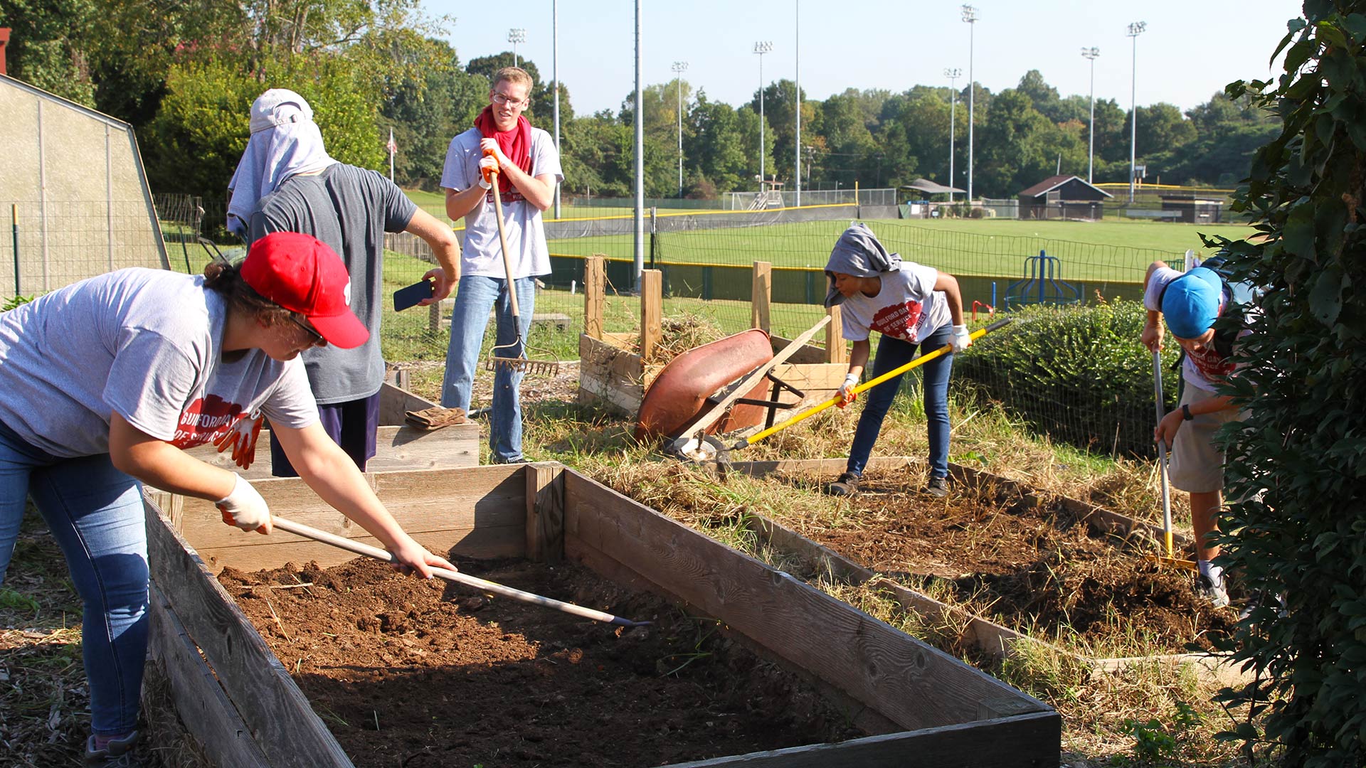 Students volunteer at the Newcomers School on Day of Service.