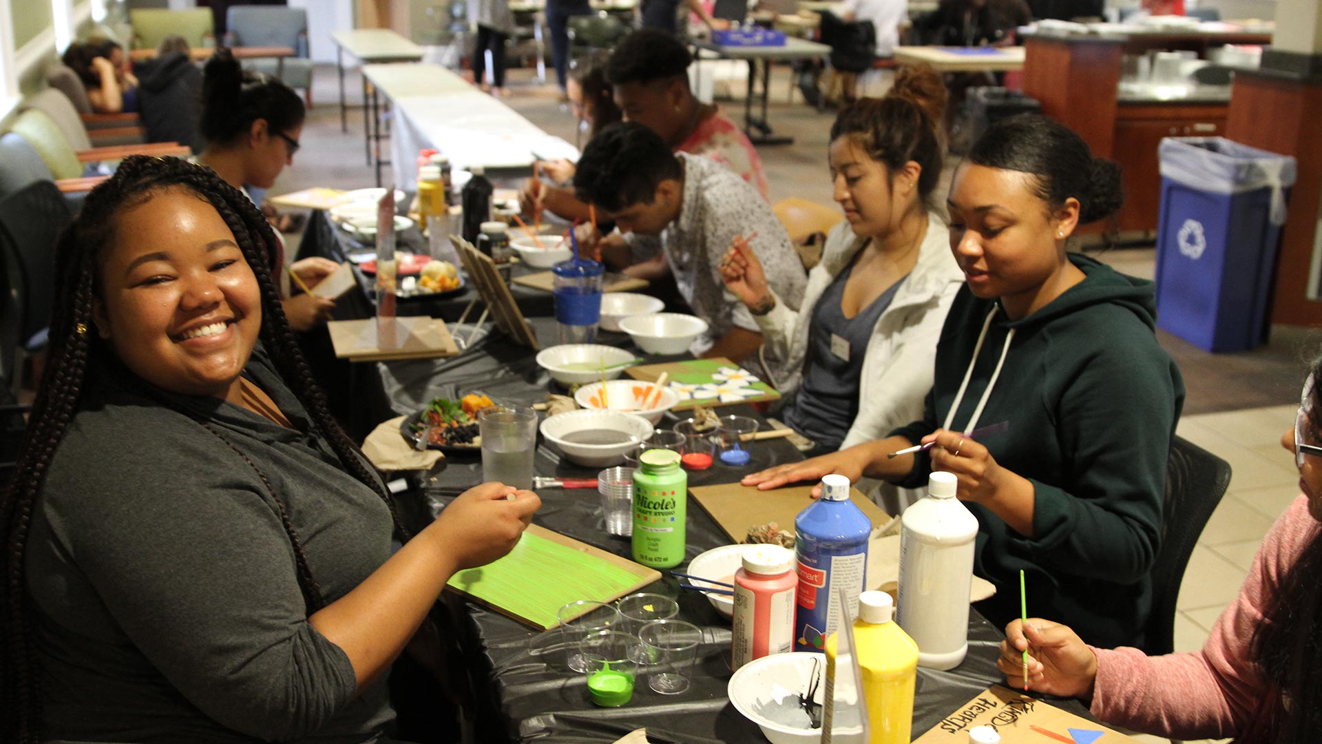 Students work on an art project together at Meadowfed.