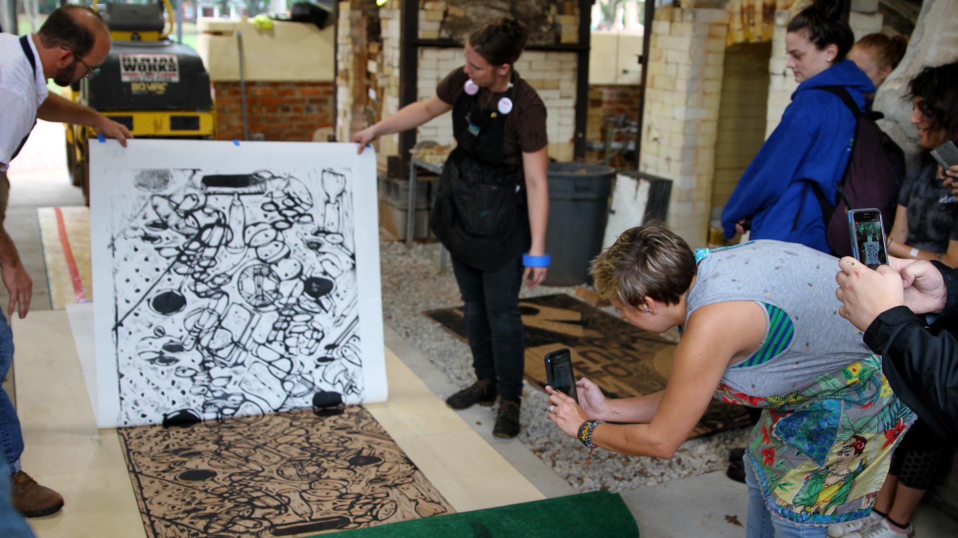 Community members make art prints together at Meadowfed. 