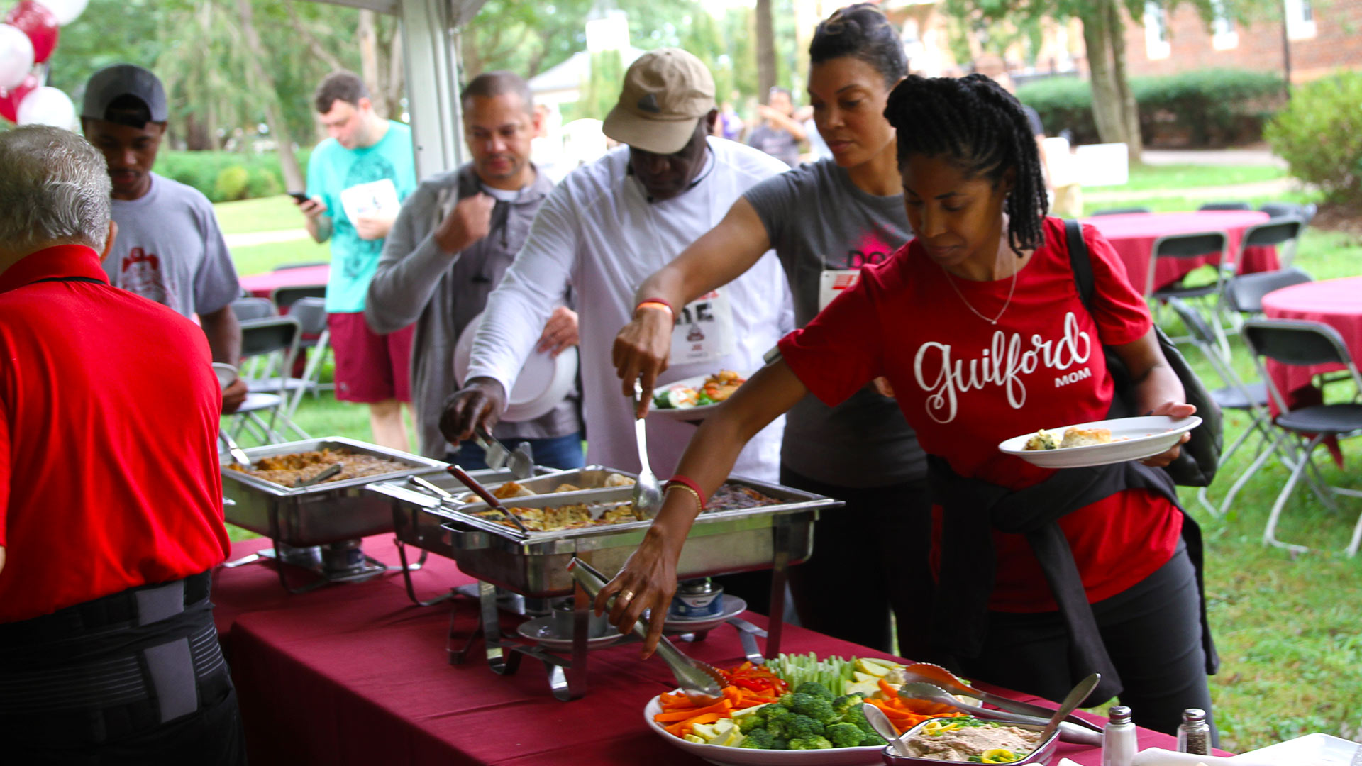 Guilfordians fill their plates with delicious food at the Homecoming brunch.