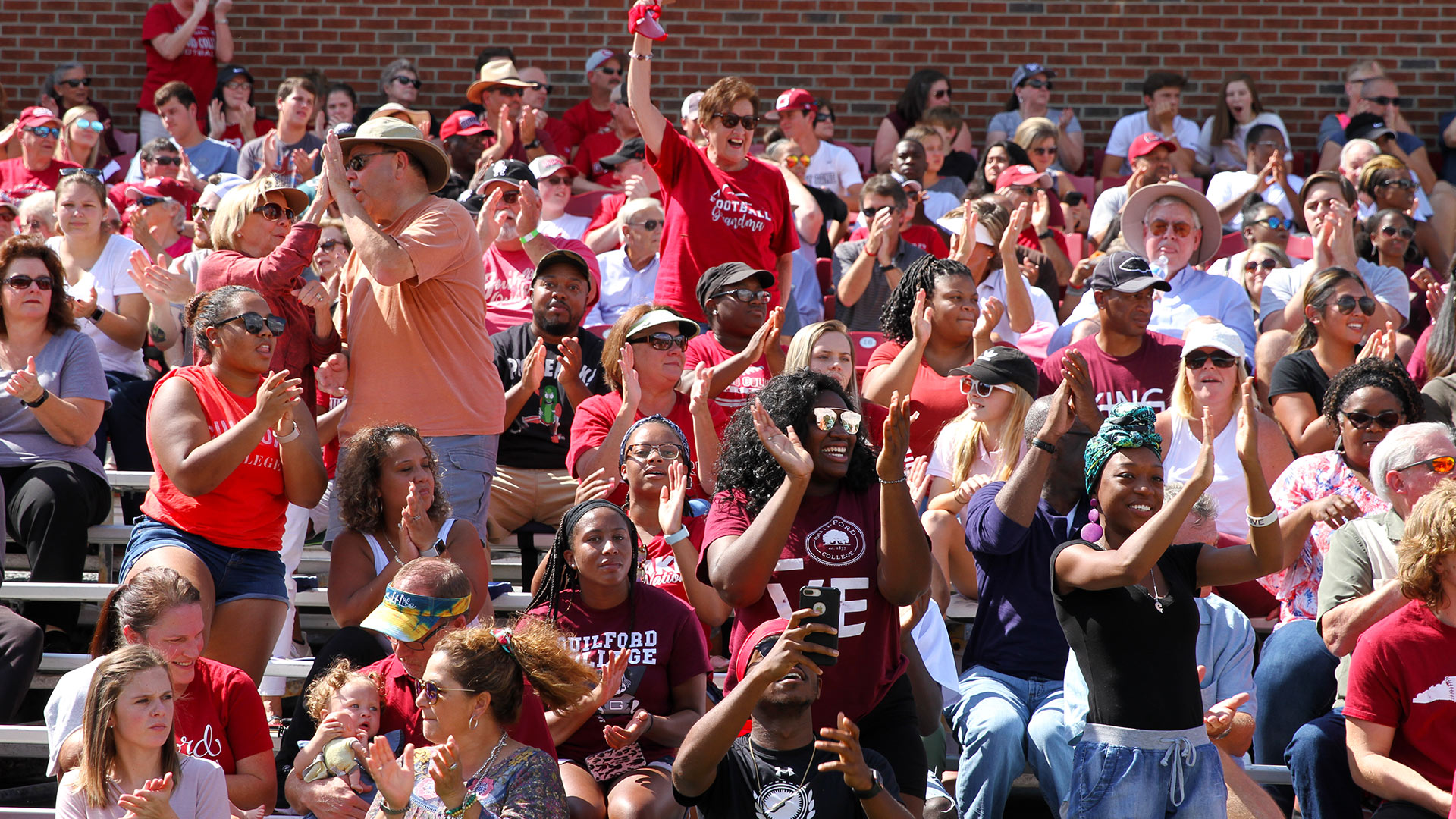 Go, Quakers! Fans support the football team at the Homecoming game vs. Bridgewater.