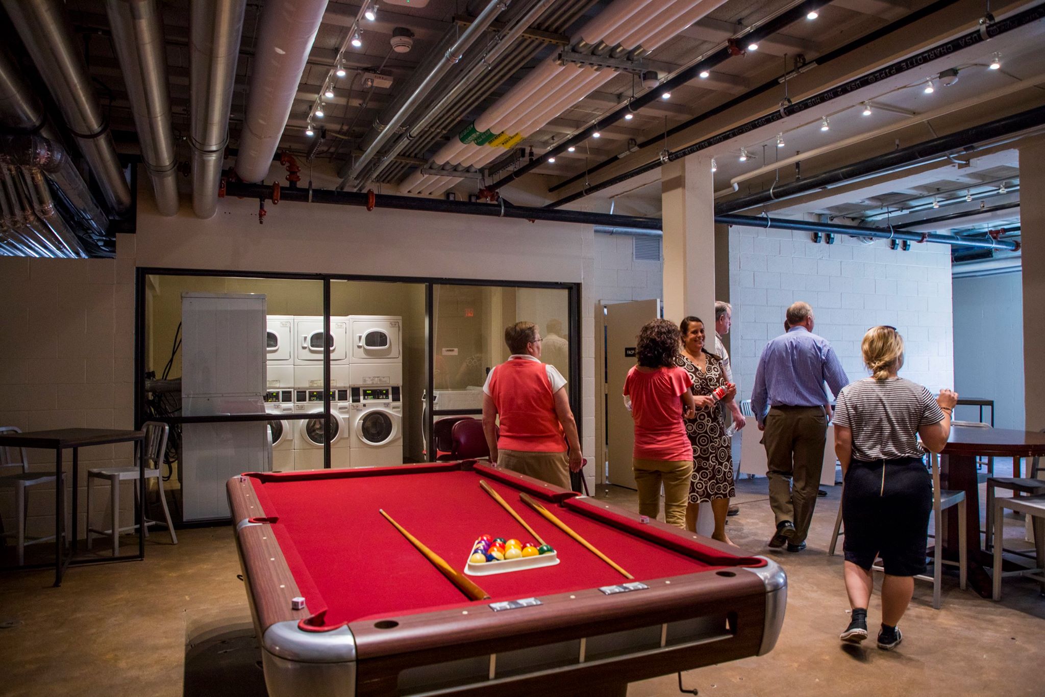 A pool table is a ready and waiting hangout spot in Binford Hall.