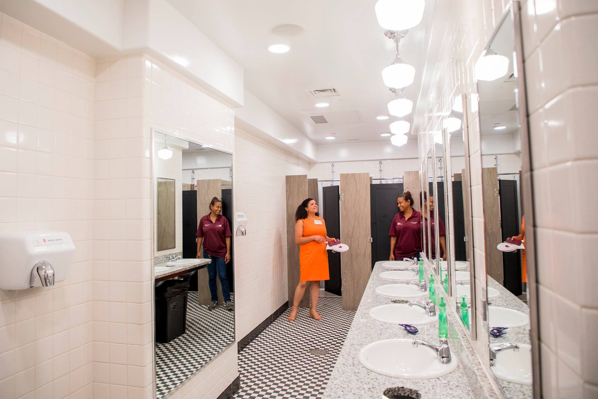 Refurbished bathrooms with bright lights and additional privacy await students in Binford.