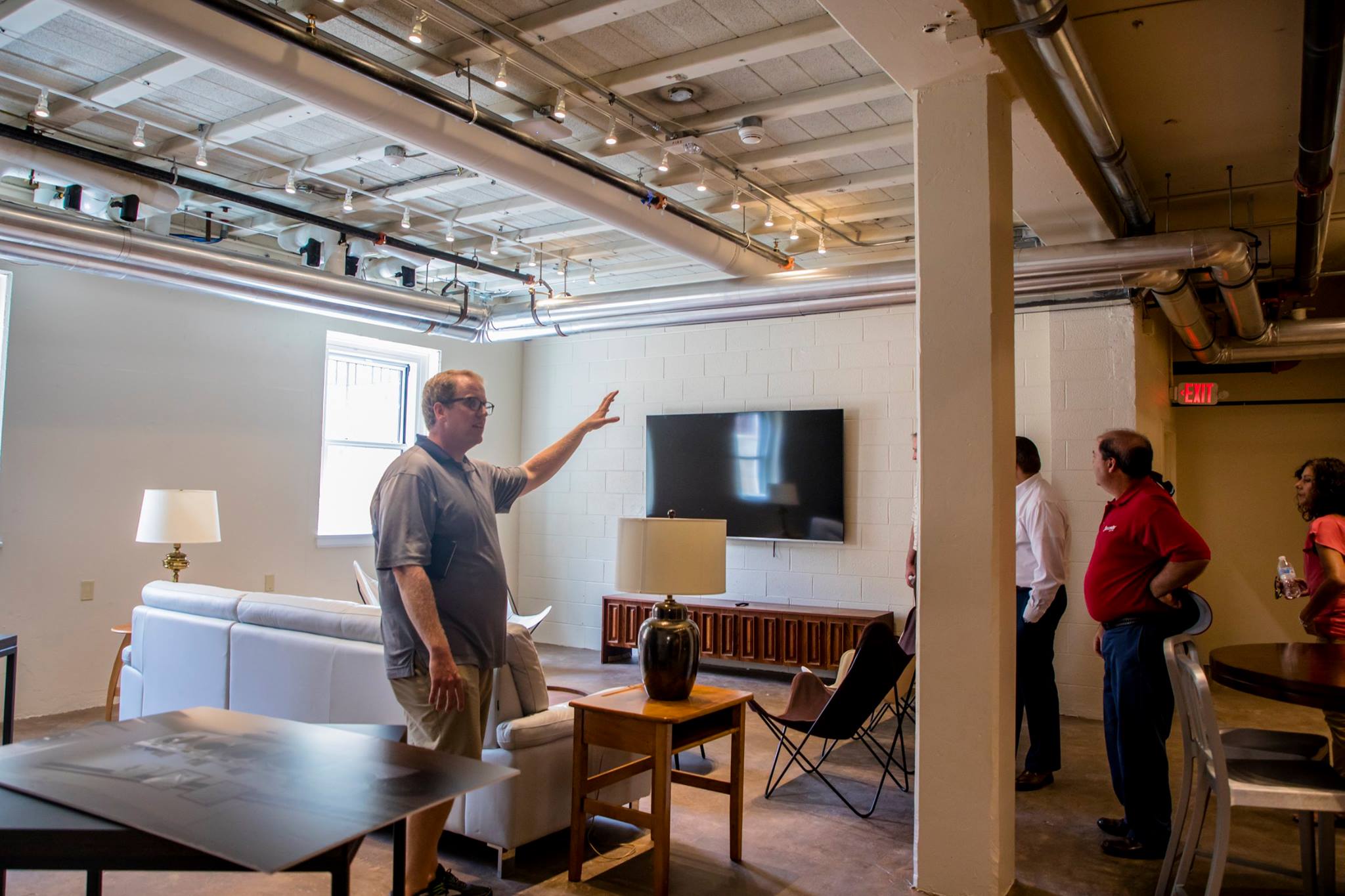 Comfortable seating and a large-screen TV await students in the Binford lounge.