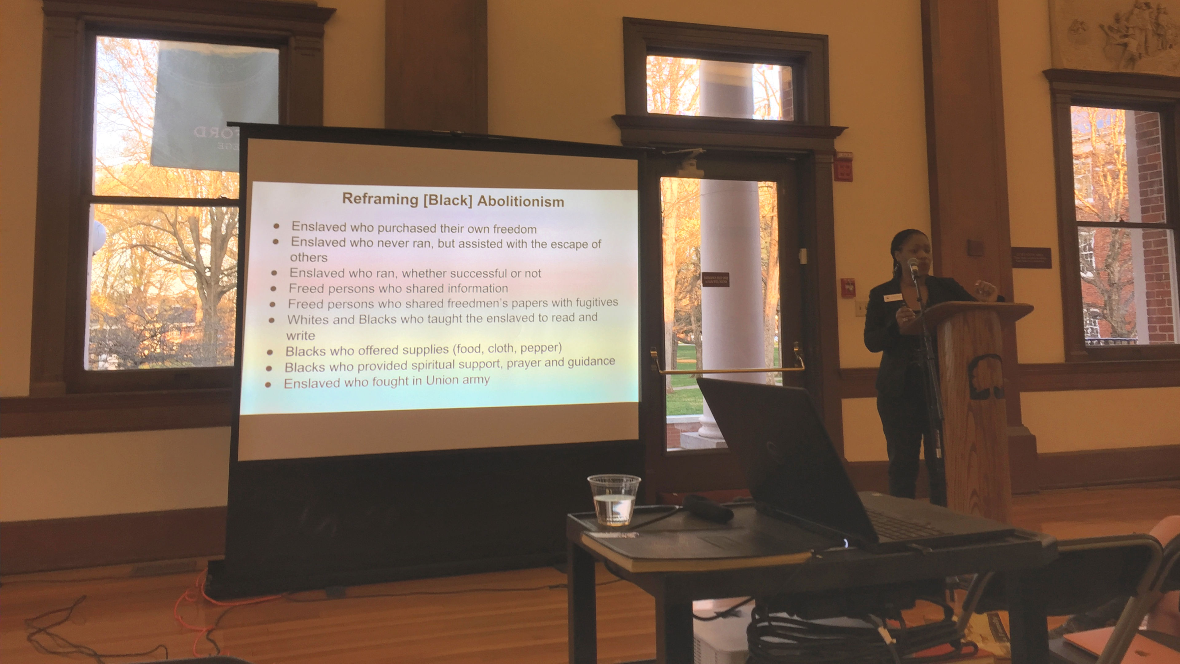 Dr. Krishauna Hines-Gaither presents her research at a QLSP lecture in the Carnegie Room of Hege Library.