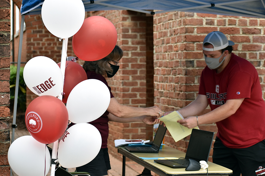 The move-in process begins outside of Founders Hall.