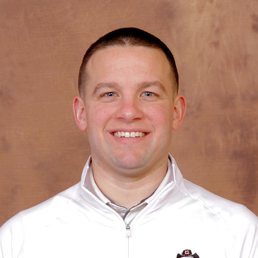 Bryan Mathews in a white pullover shirt