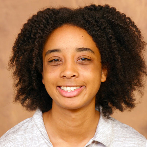 Tinyah Ervin in a grey polo