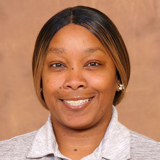Tasia Gist in a grey polo