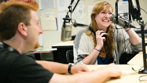 Students work in the WQFS 90.9 FM booth in Founders Hall.