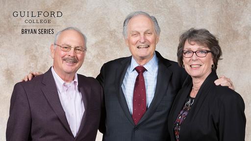 Two subscribers stand with Alan Alda at the Legacy Society.