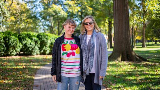 Caroline Sprenger '22 and Biology Professor Michele Malotky take a photo in the Quad.