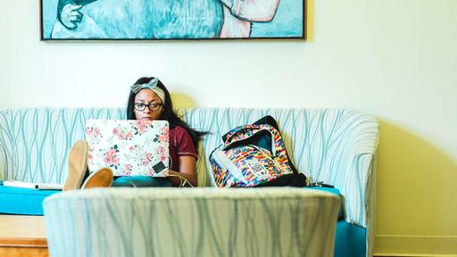 A student studies in a cozy nook in Hege Library.