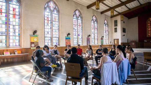 Students sit in class inside a church during a visit to New Orleans.