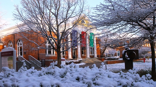 A photo of the front of Hege Library after a snowstorm.