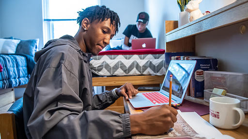 Students doing homework in Milner Hall dorm