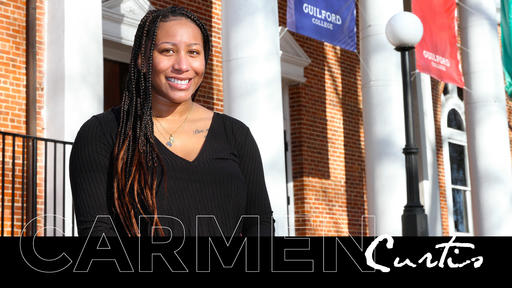 Photo of Carmen Curtis '21 standing outdoors in front of Hege Library