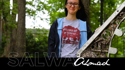 Photo of Salwa Ahmad standing outdoors on Guilford's campus.